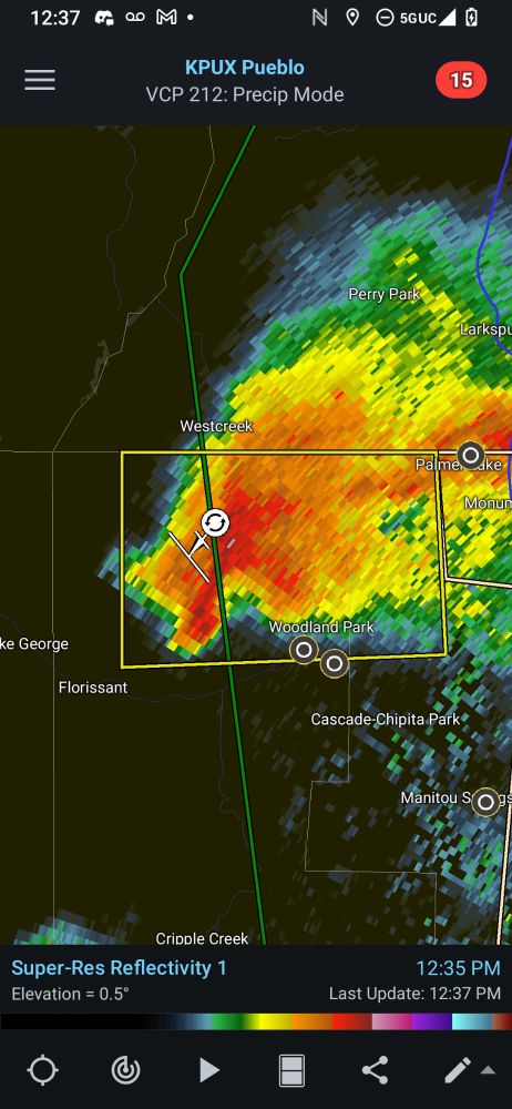 A screenshot of a radar scan showing a supercell with a severe storm warning. This warning is flagged possible for a tornado.