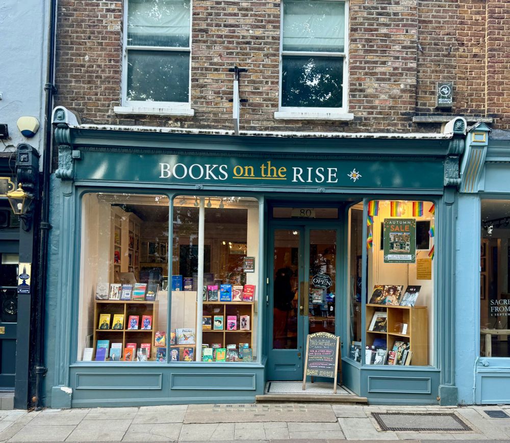 An independent bookstore: Books on the  rise in Richmond upon thames. Victorian green blue building.