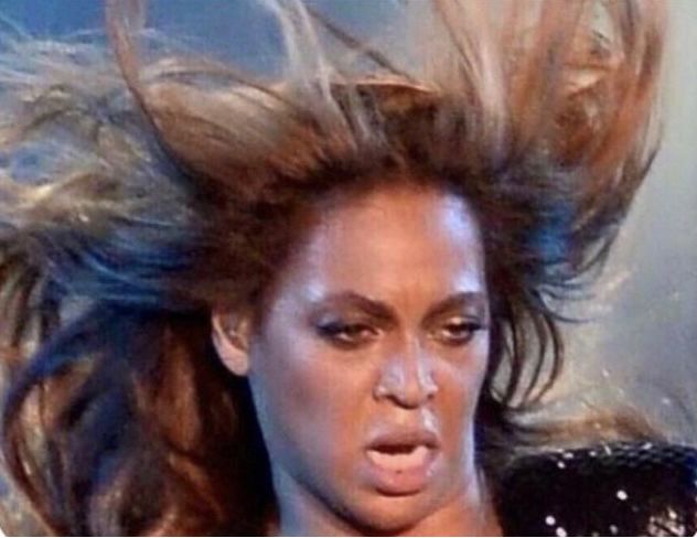 Beyonce looking like she's taking a warm wind in her face.