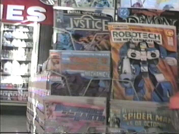 Blurry Screen Grab of a Comic Book spinner rack from a home movie