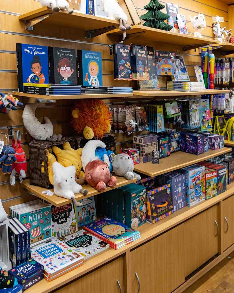 A close-up of the shelves in the Jodrell Bank shop packed with science-themed gifts such as toys and books.