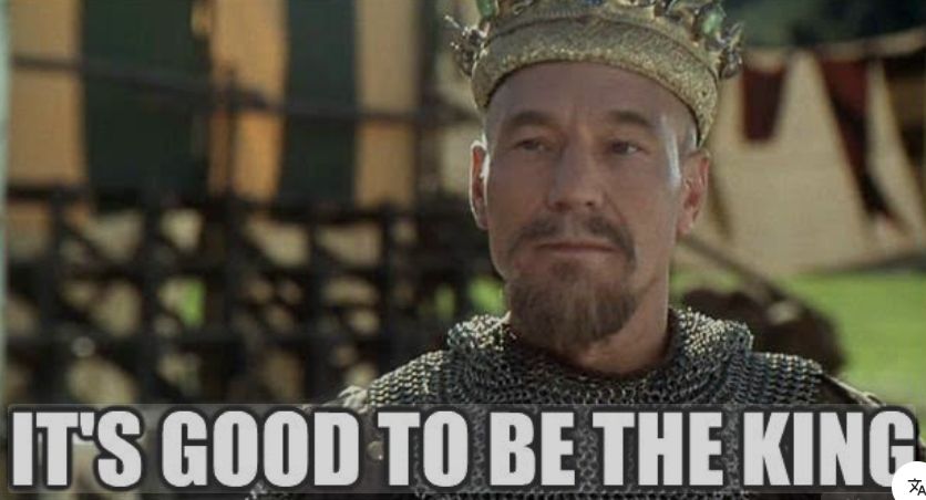 the words "IT's GOOD TO BE THE KING" on the photo of a man dressed like a king from a movie still