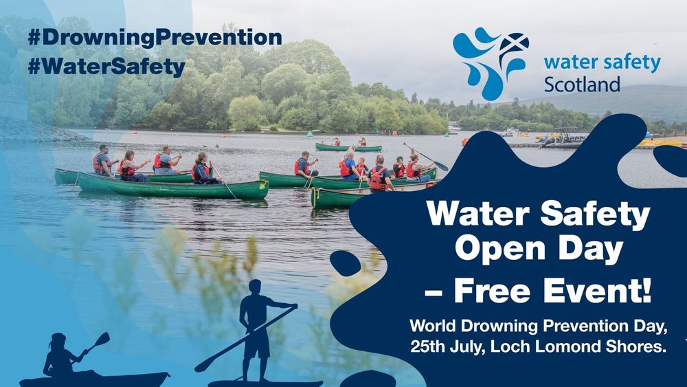 Group of people wearing life jackets paddling green canoes on a calm lake surrounded by trees at Loch Lomond Shores during a water safety event. Text reads - Water Safety Open Day - Free Event! World Drowning Prevention Day, 25th July, Loch Lomond Shores.