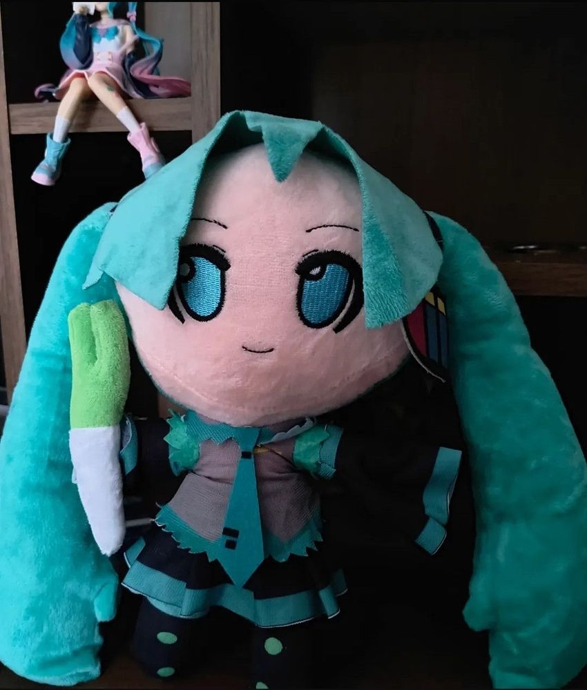 picture of an offbrand hatsune miku plushie with an extremely large forehead and a small face                                                #miku #初音ミク #plushies #plush #meme #shitpost
