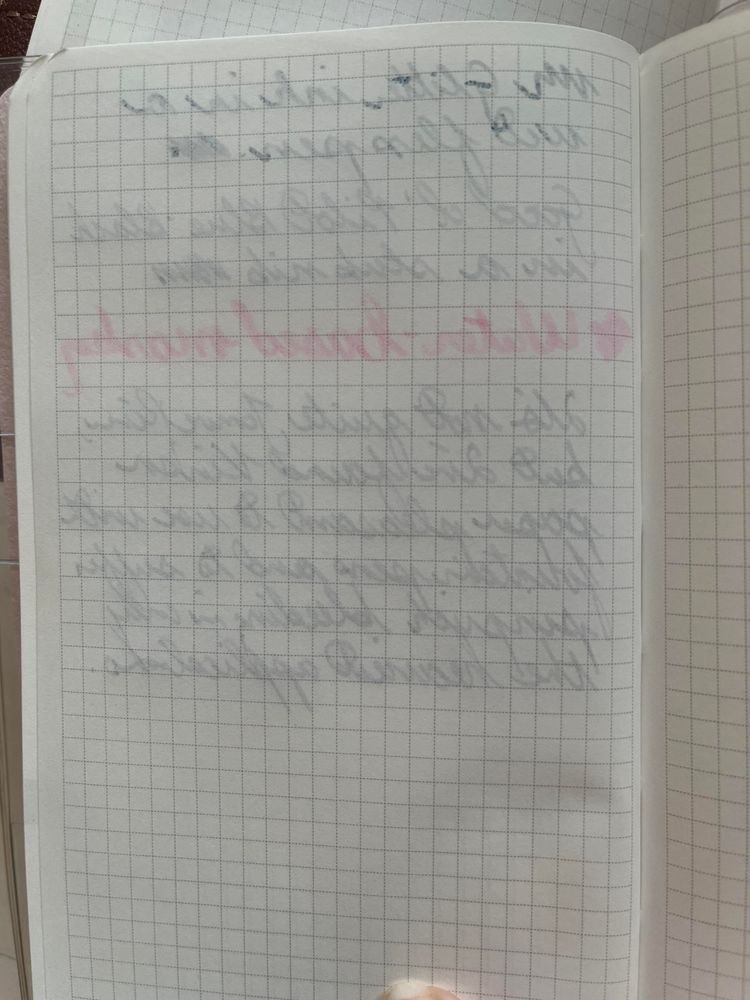 the back side of the notes page to show that the heaviest, wettest ink has bled through a little bit but the others have not (there is however shadow, since like a hobonichi the paper is thin) 