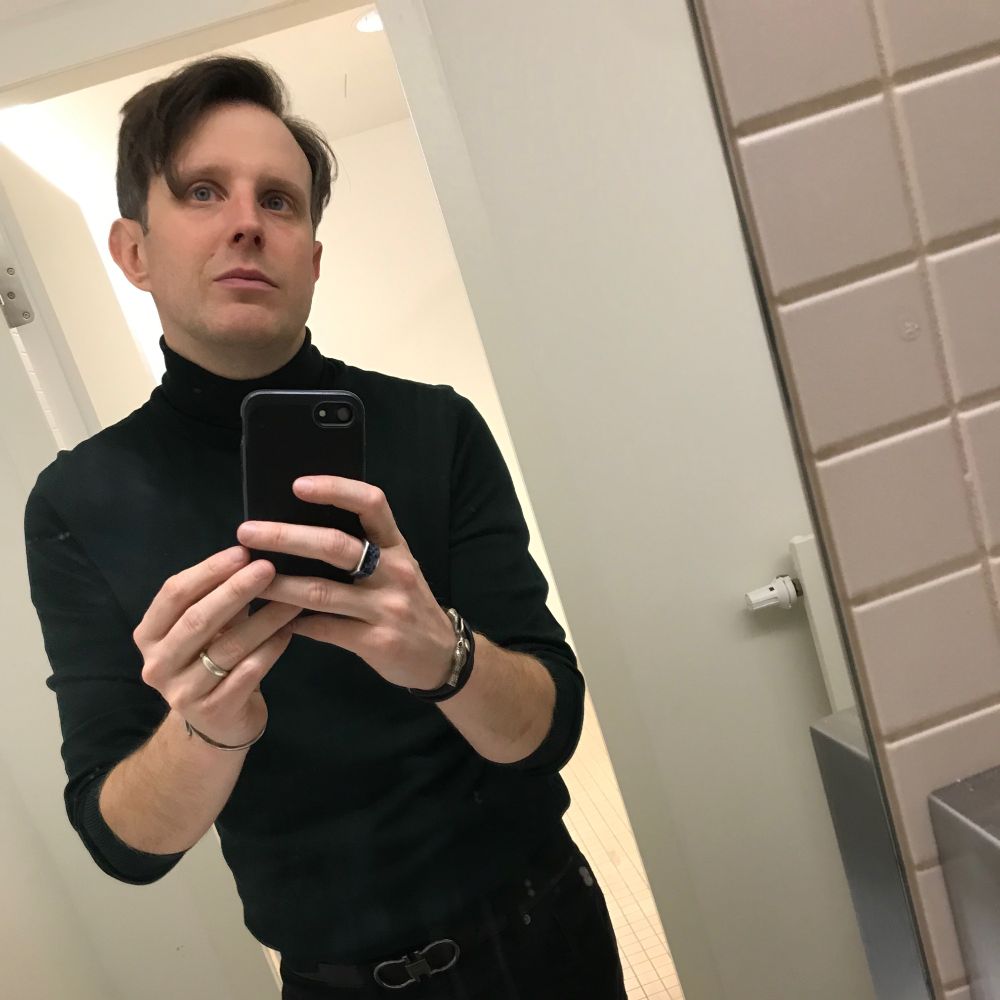 big hair in the mirror