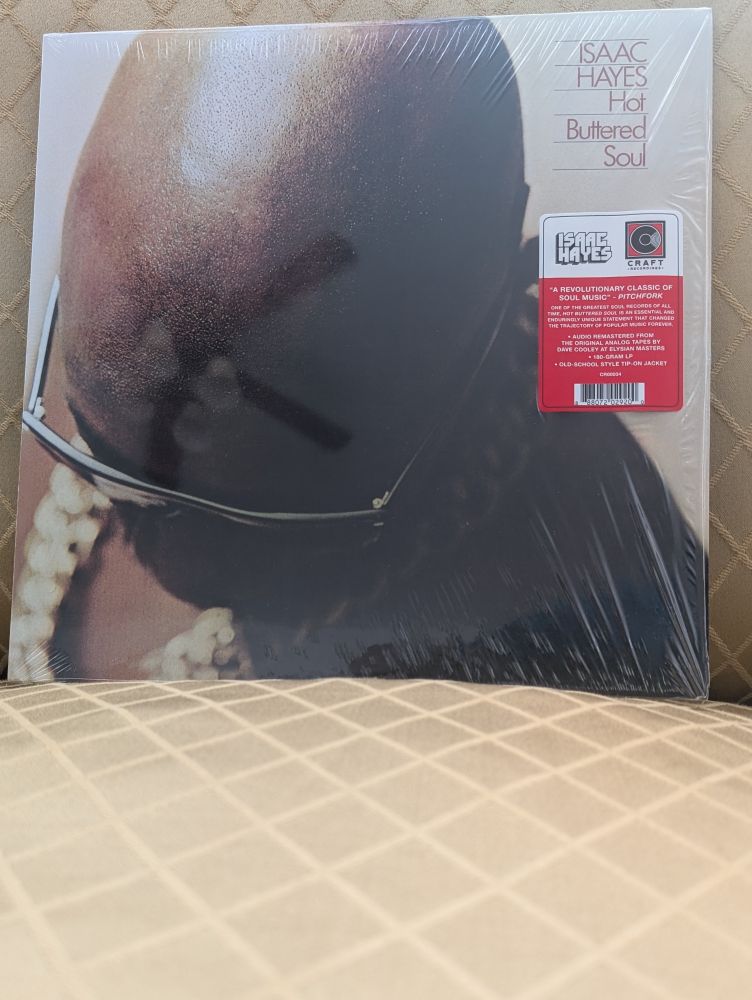 Cover of a remastered vinyl version of Hot Buttered Soul by Isaac Hayes.