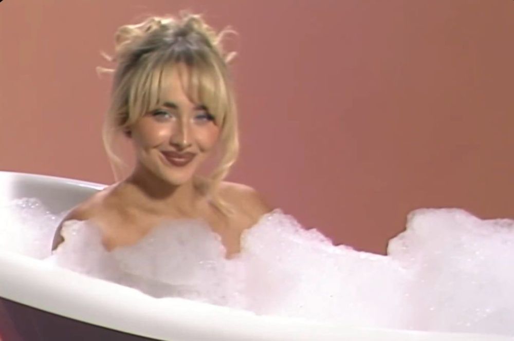 Sabrina Carpenter in the bathtub with bubbles 