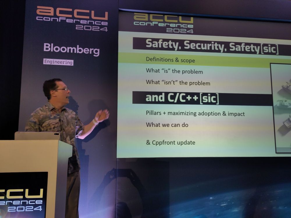 Herb Sutter in front of his first slide with the title Safety, Security, Safety(sic)