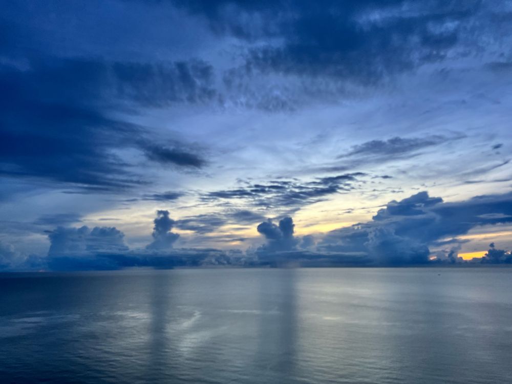 Monsoon sea and cloudscape where water abd sky meet 