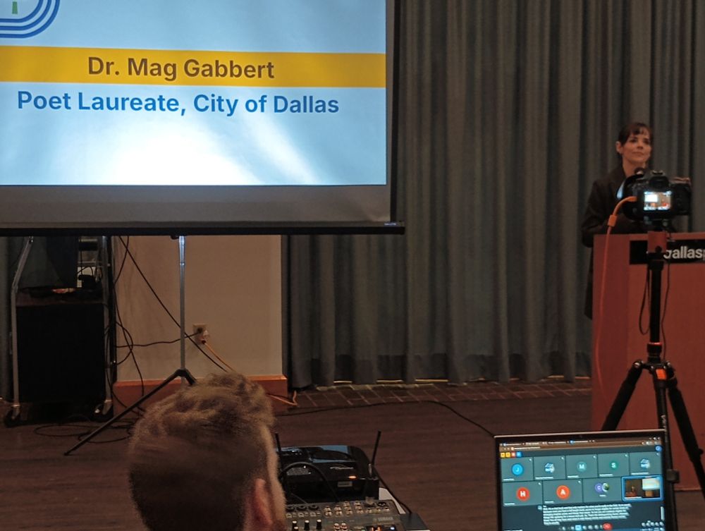 Dallas Poet Laureate Mag Gabbert shares her poetry with the Dallas Area Transit Alliance at the Erik Jonsson Public Library.