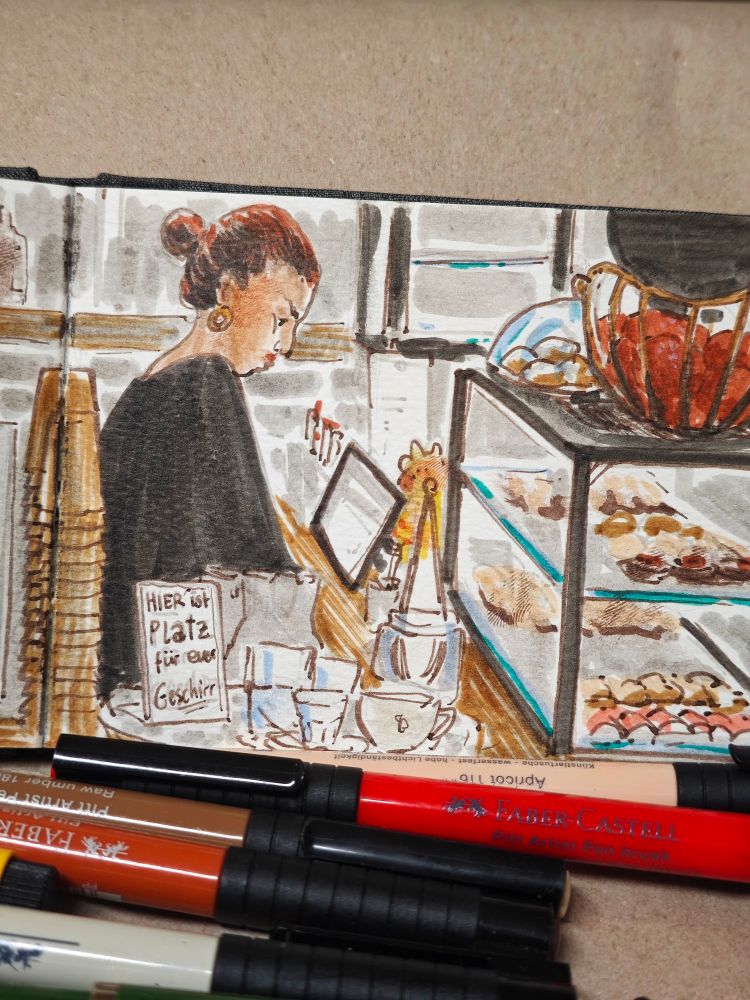 Second page of a color drawing capturing a scene in a café 