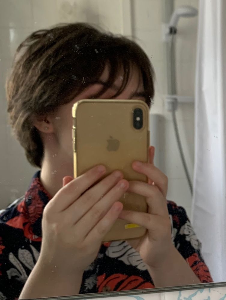me with short hair... and my iphone 11...