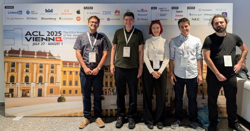 Sina Ahmadi, Rico Sennrich, Michelle Wastl, Jannis Vamvas, Andrianos Michail from the Department of Computational Linguistics posing in front of the at ACL 2025 Vienna step-and-repeat banner  