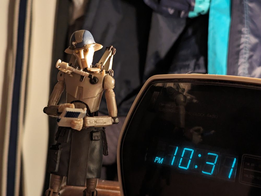 Professor Huyang figure from the hit flop series Star Wars: Ashoka; twinky little beige bot with a slutty little apron and an ipad for fixing things