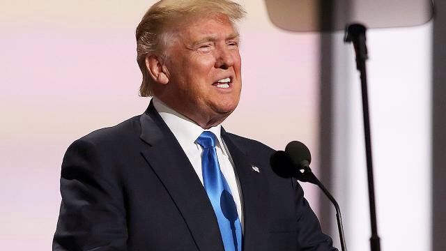 “I said to him, is that like the real one or is that a copy?” the Republican nominee said moments after taking the stage at a local high school.