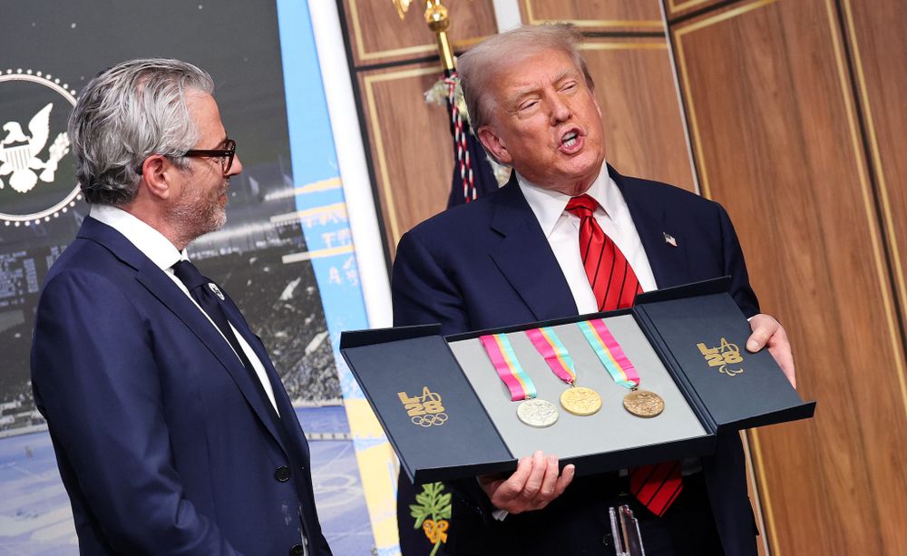 Donald Trump was pretty excited when 2028 L.A. Olympics organizing committee boss Casey Wasserman handed him a box of Olympic medals at a White House Ceremony.