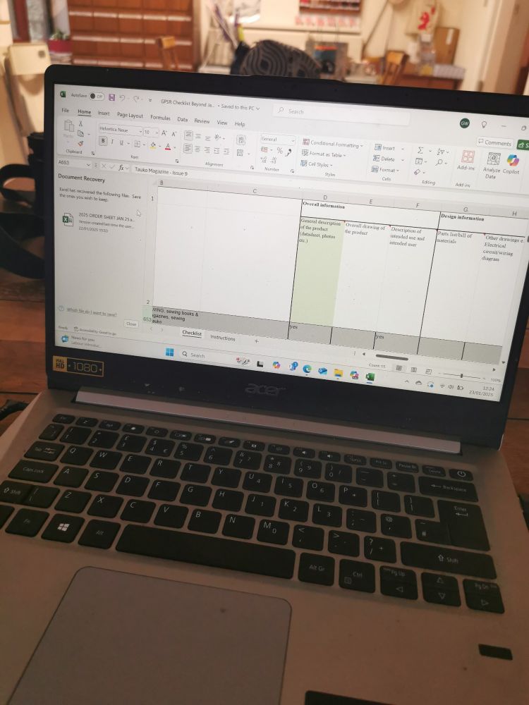 An open laptop with an amost empty excel spreadsheet on the screen. 
