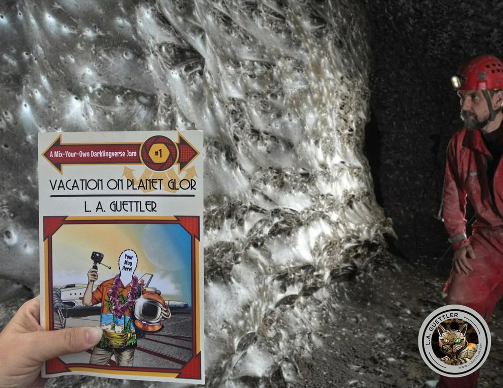 The creepy-ass cave spider megacity with someone holding the book Vacation on Planet Glor in front, as though they are visiting the site on a fun getaway
