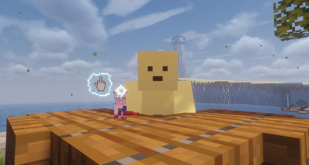 Minecraft screenshot of a yellow player sitting behind a desk outside. On the desk is another player, assuming the form of a tiny unicorn. The tiny unicorn is magically conjuring a middle finger at the camera.
