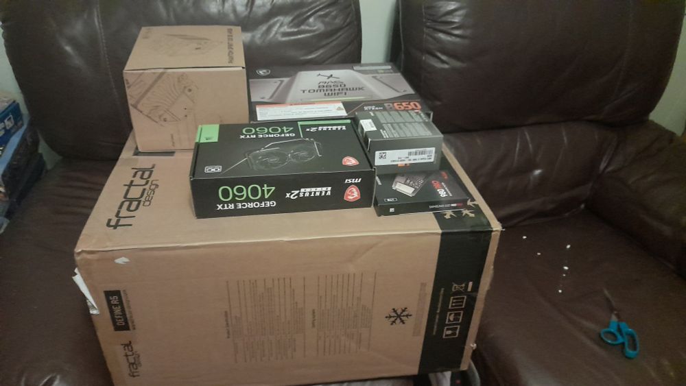 a stack of boxes containing computer parts