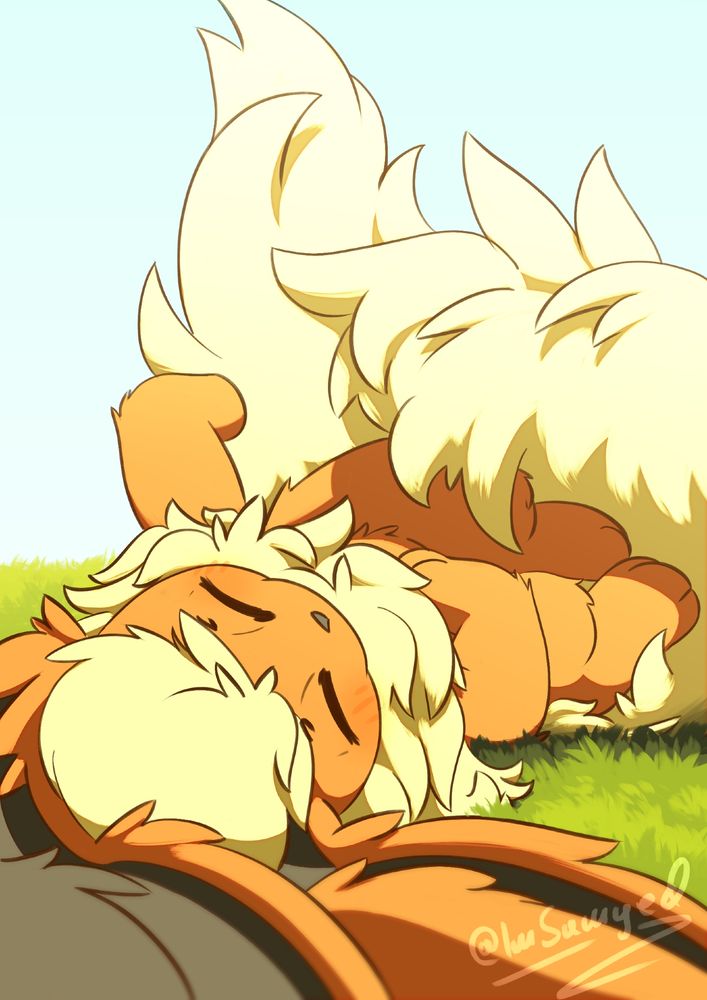 A Flareon lying on its back in a sunny meadow, asleep. It has the usual orange Flareon fur, with a bright yellow head tuft, mane and tail as well as dark grey inner ears. It's displayed with a camera view very close to the ground, from the top of its head. The ears are very close to the camera as a result, the rest of the body is much further away.
