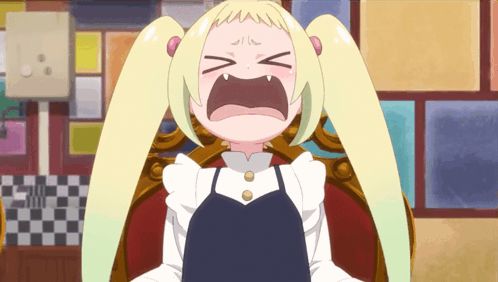 a cartoon girl with blonde hair is crying with her mouth open