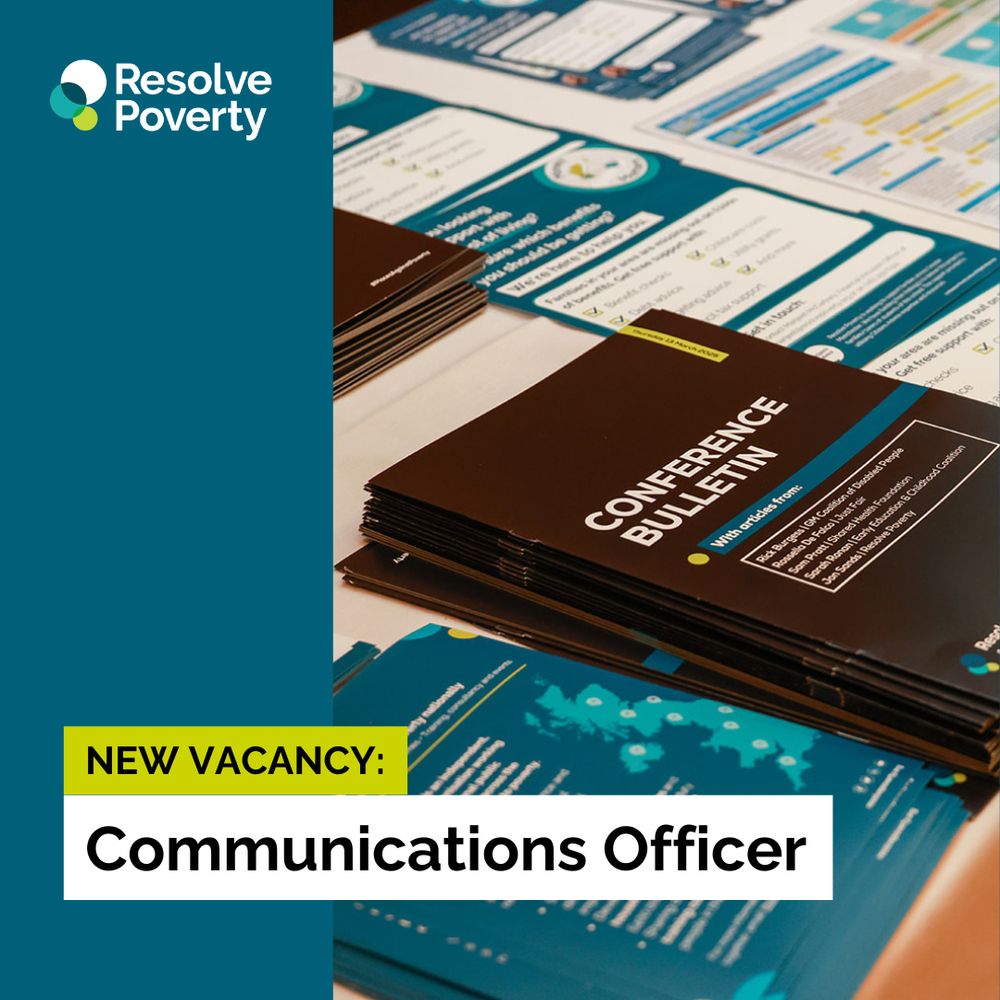Resolve Poverty branded flyers and resources are stacked in piles on a table. A banner overlaying the photo reads 'New vacancy: Communications Officer'.