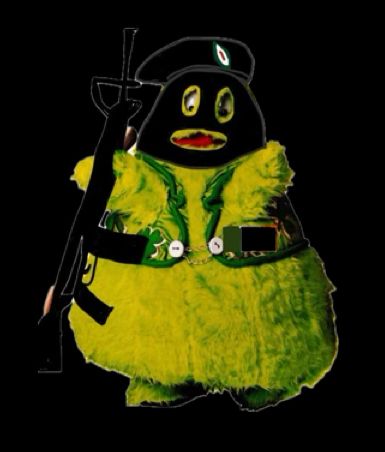 A picture of the discontinued McDonald’s mascot “Uncle O’Grimacey”; a large green version of Grimace wearing a green vest. In this image he has been photoshopped to be wearing a balaclava and beret with the IRA Easter Lily logo on it and is holding a military style rifle. 