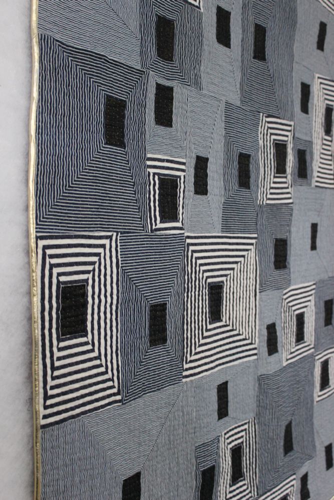 Striped Denim hand quilted quilt with dark centers