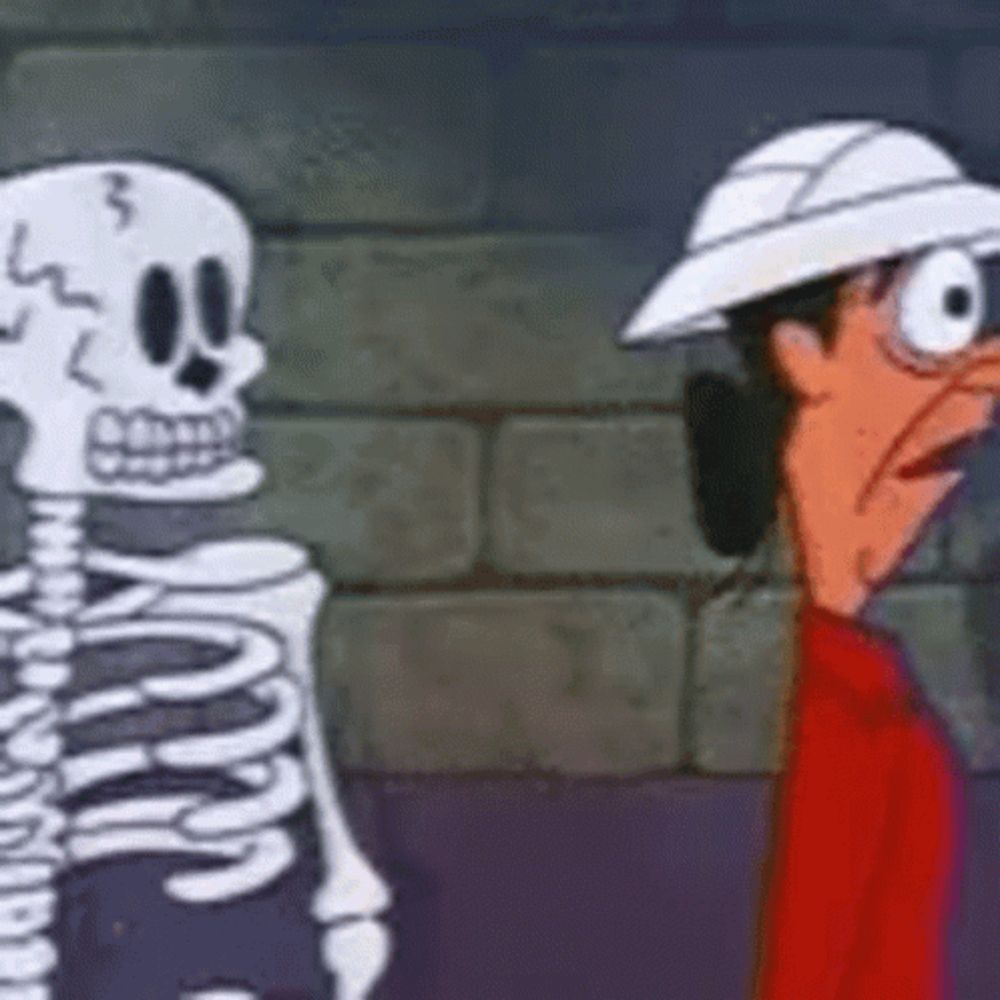 a cartoon character wearing a hard hat is standing next to a skeleton .