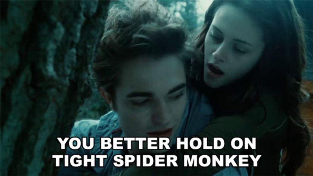 a man and a woman are hugging with the words " you better hold on tight spider monkey "