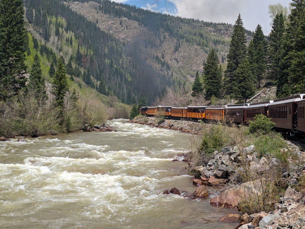 The Durango Silverton narrow gauge passes next to the Animas River.