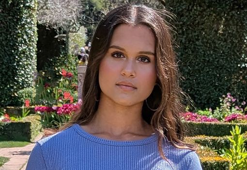 Close up of Anike Jena standing in garden