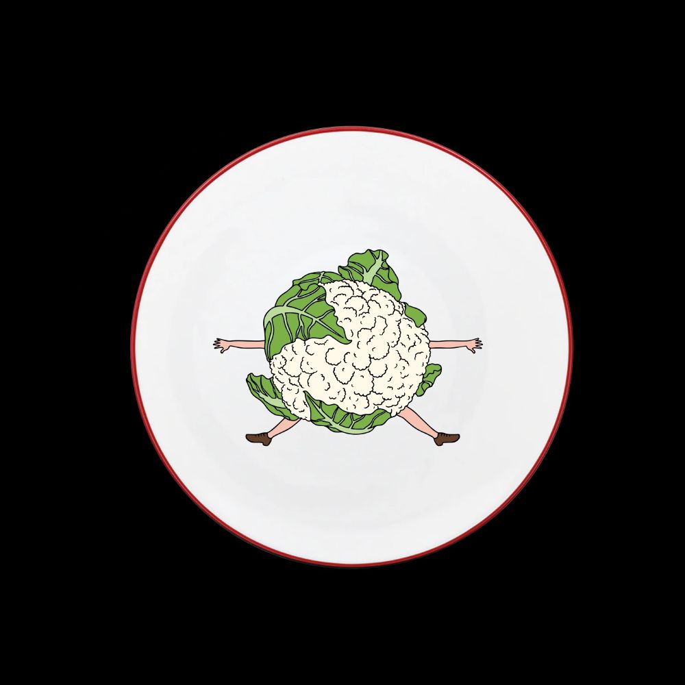 Plate from the Bouillon Pigalle restaurant in Paris. Red rimmed, this one has a green cauliflower with legs on it.