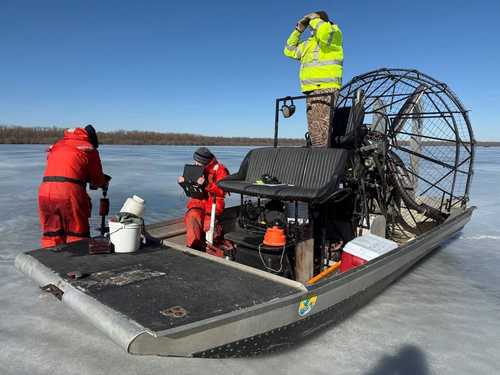 Water quality sampling from an airboat on a frozen backwater lake of the Illinois River 