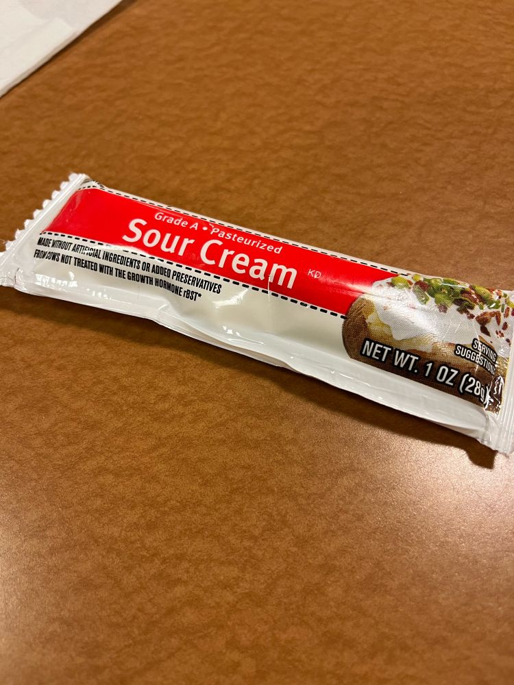 A small tube of sour cream