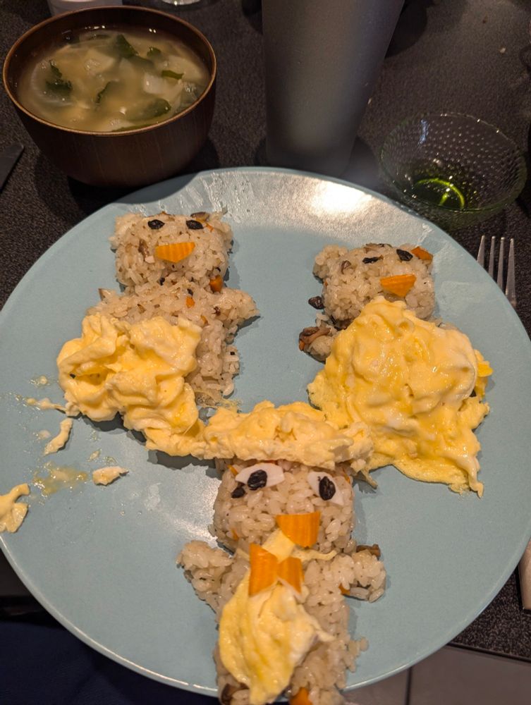 Miso soup 
3 bears made of rice, with surimi and omelette on top
