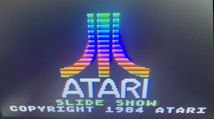 Slide Show title screen.

==Transcript:==
ATARI
SLIDE SHOW
COPYRIGHT 1984 ATARI

(Source: https://www.atariprotos.com/5200/software/slideshow/slideshow.htm)