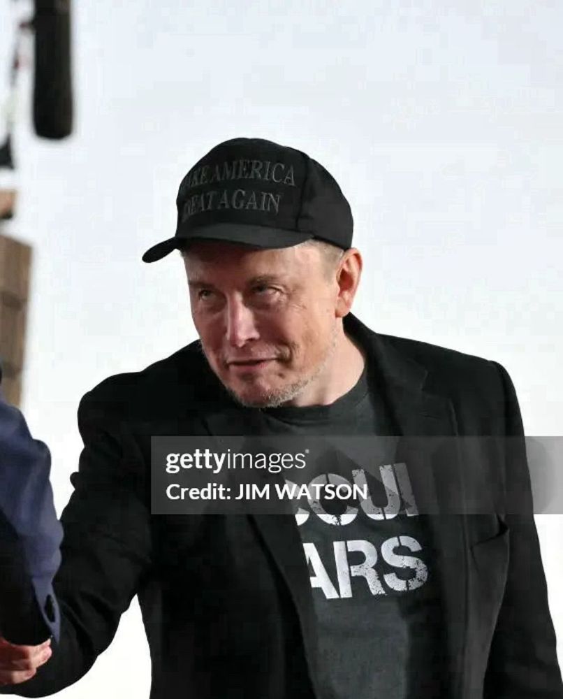 Elon Musk with a decrepit looking facial expression.