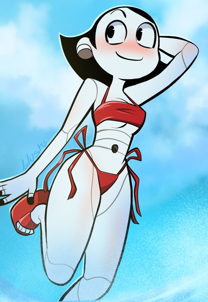 Mallet in a red two-piece bathing suit posing cute against a blue sky!