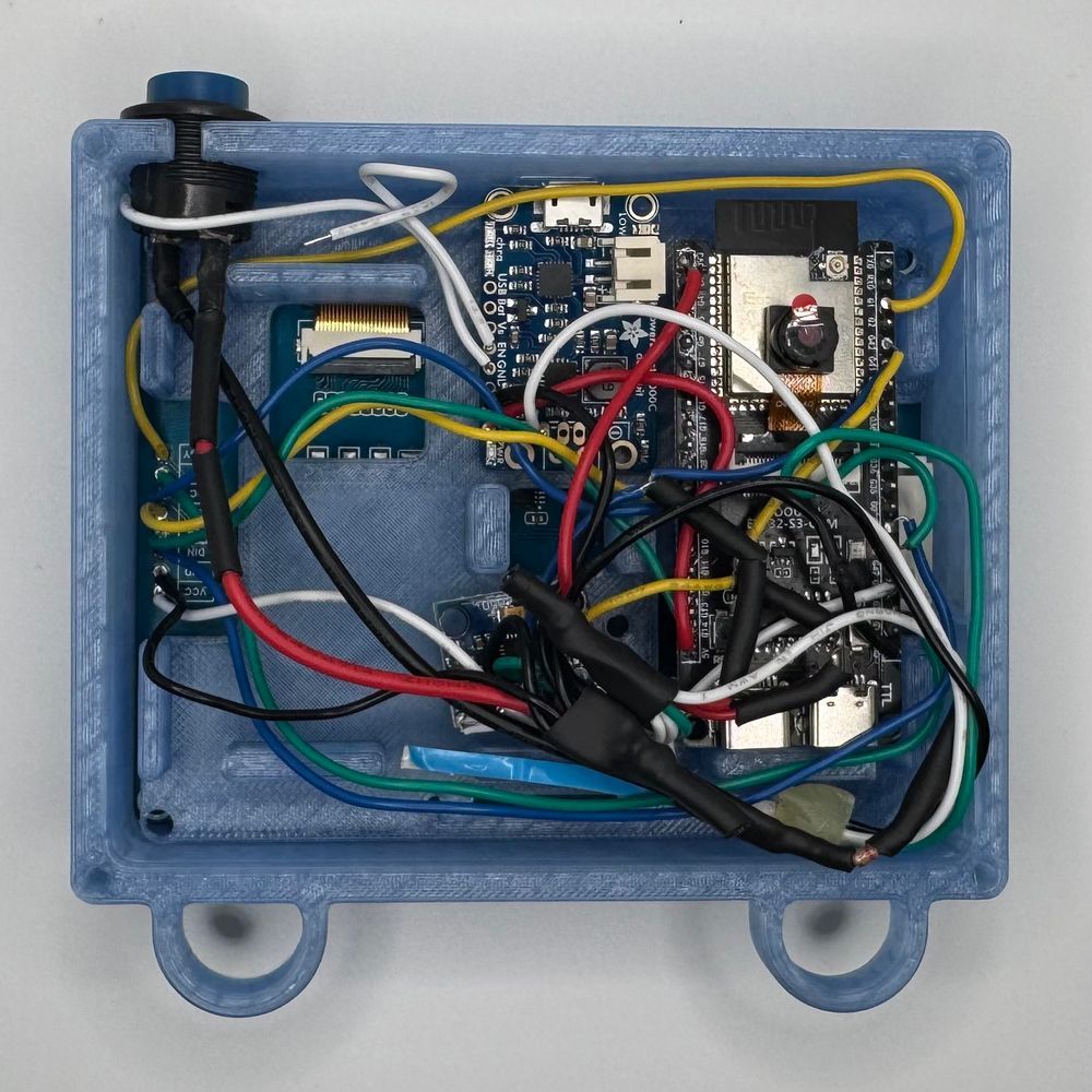 poloroid badge prototype with the back off
