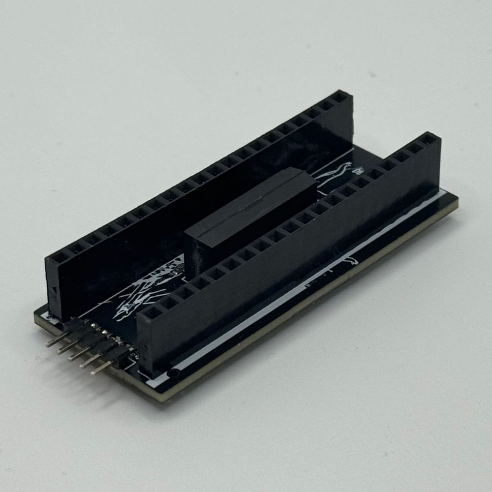 black and white circuit board viewed from a top 3/4 angle on a white background