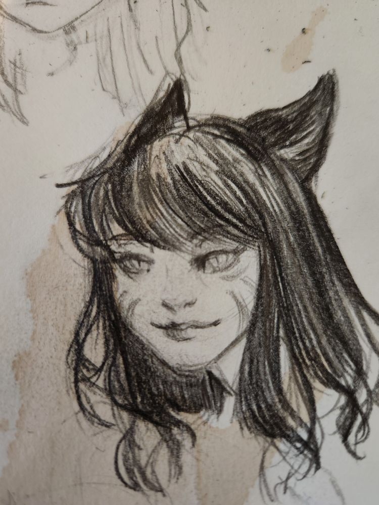 Pencil sketch portrait of a female miqote