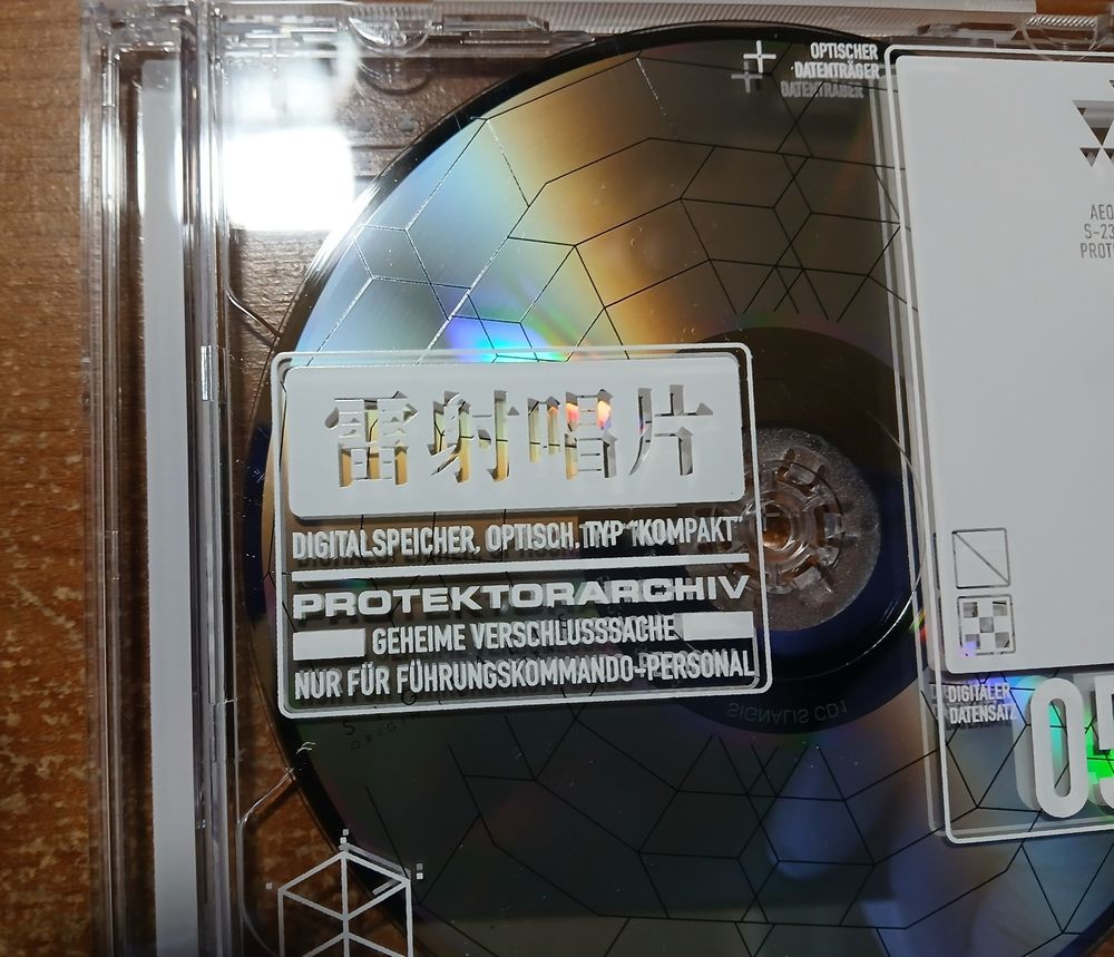 Close up of the jewel case with Eusan Nation labels on it. 