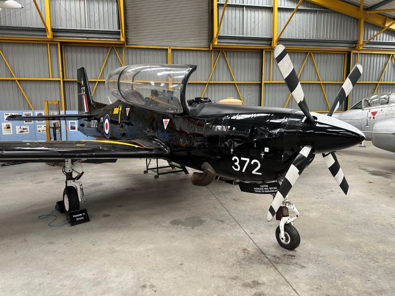 Our all black painted Tucano trainer displayed in Hangar 2