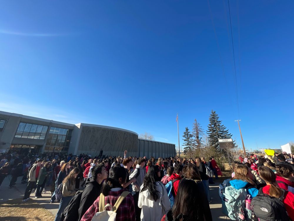 Students outside of Central Memorial High School in Calgary, Alberta walking out of class in support of their teachers and for better conditions in classes.