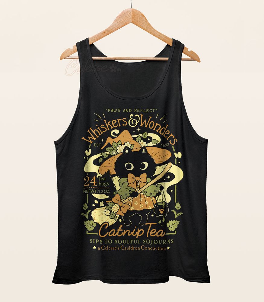 A photo of a tank top hanging from a wood hanger. The shirt is black and the print features a faux logo for Whiskers & Wonders Catnip Tea, the center graphic showing a black cat in a dress and pointed hat holding a smoking cauldron.