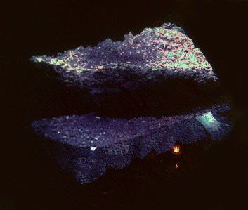 Thames skiff Tyho, just visible at the foot of the image. That's a candle lantern.