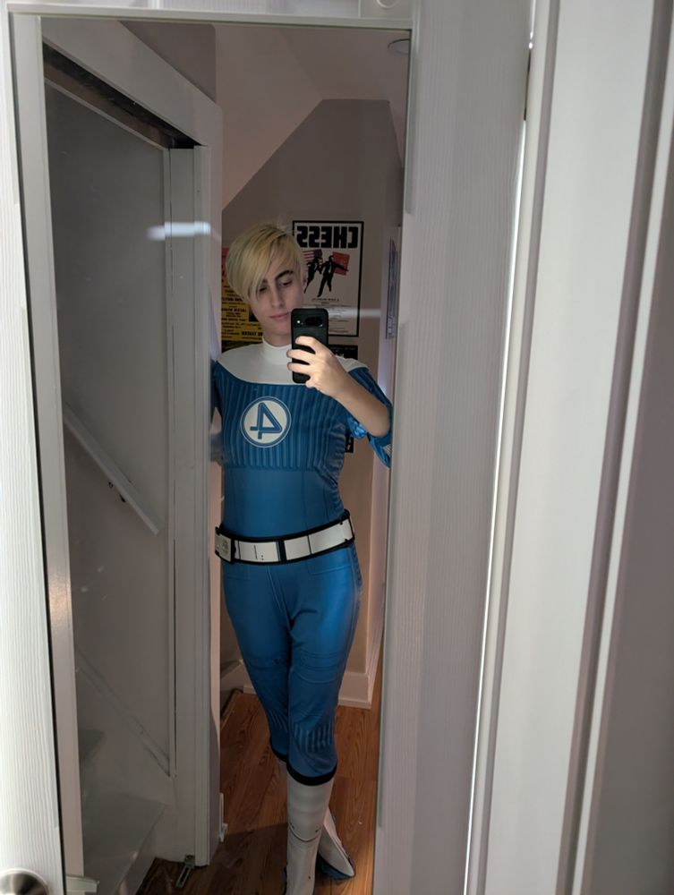 A woman in a fantastic four suit from Fantastic Four First Steps
